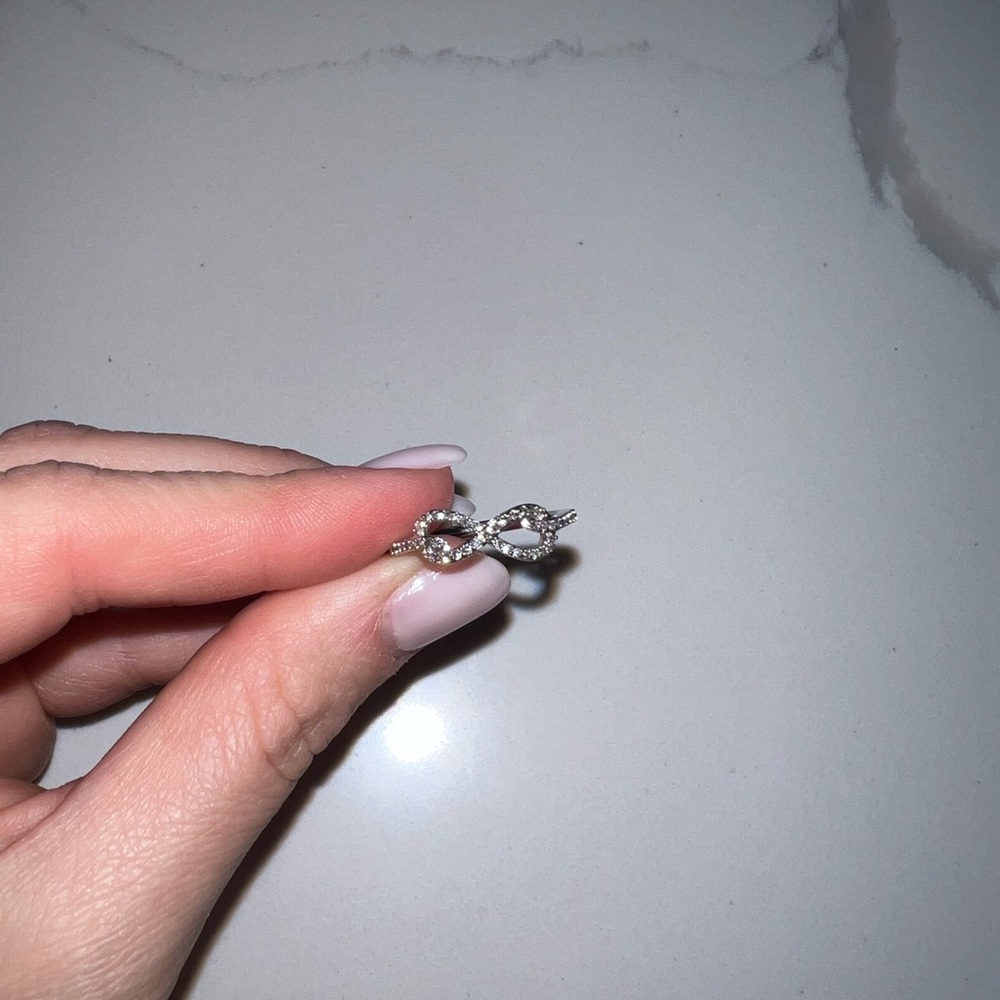 Diamond infinity ring - sterling silver - size 7 - excellent condition.